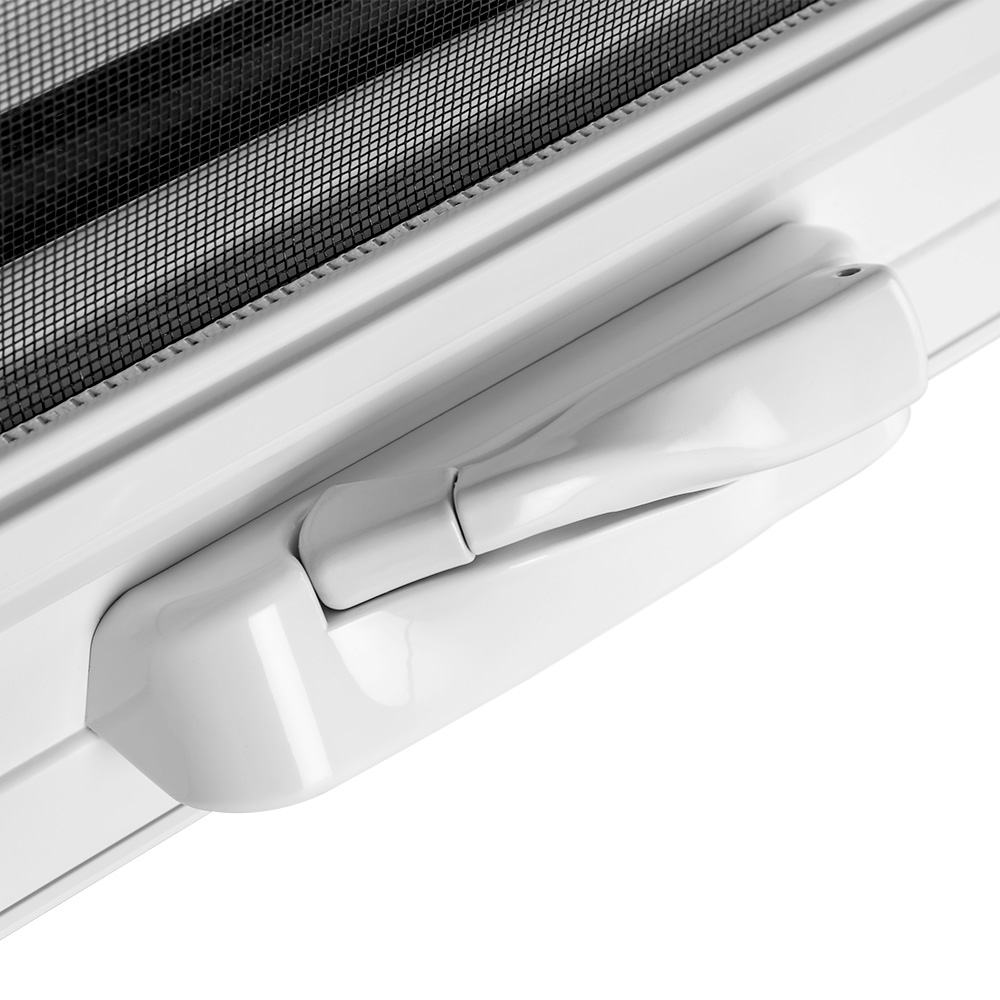 Detailed view of a white window with a handle, showcasing its clean lines and contemporary aesthetic.
